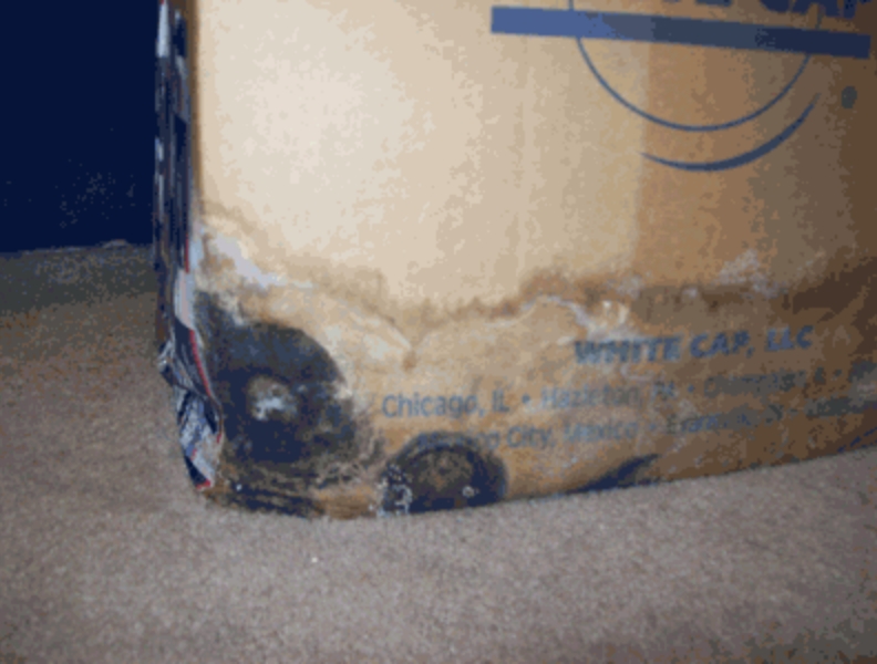 Photo of waterlogged box with mold | MOLD INSPECTION | DRY BASEMENT®
